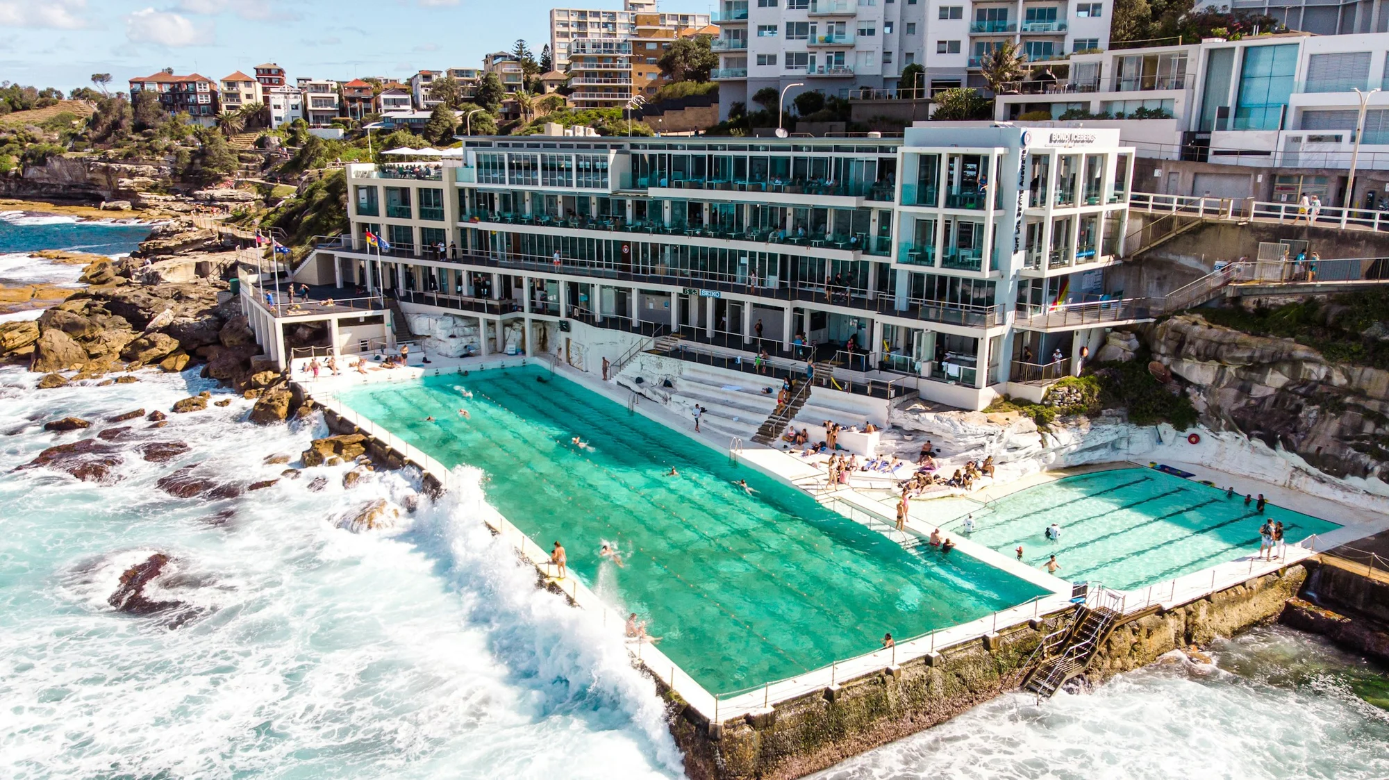 The turquoise Bondi Icebergs swimming pools beside the ocean in Sydney, Australia.